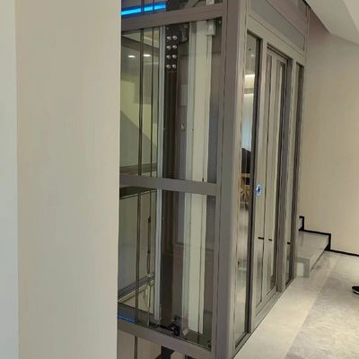 Elevador para casa de tração com 30 m de altura de viagem acionado por um sistema de tração sem engrenagem certificado ISO9001